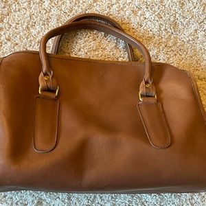 Vintage Coach leather purse with serial number.